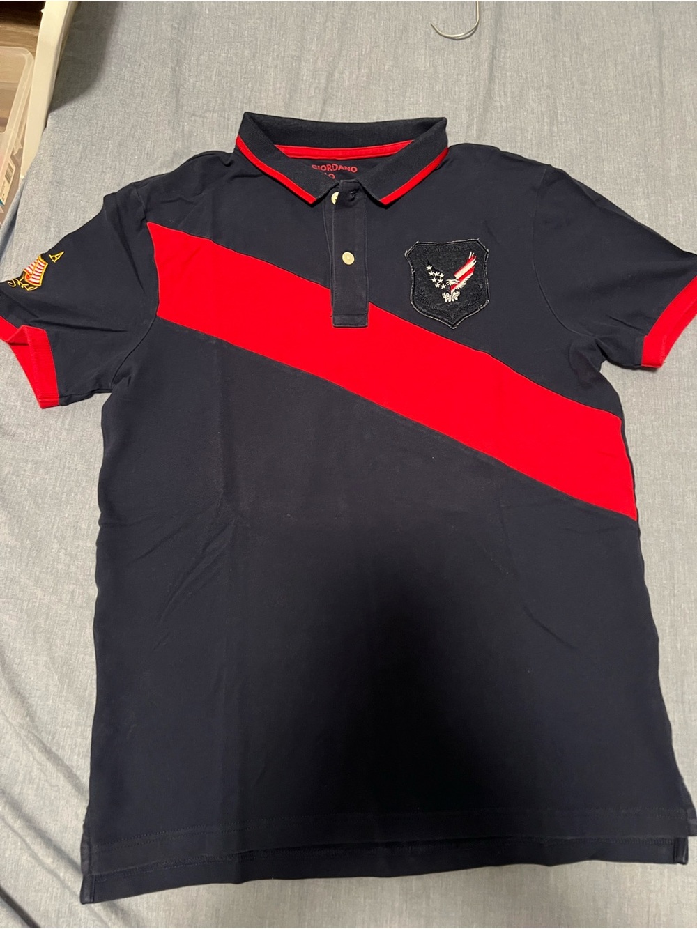 Giordano Navy Polo with Red Diagonal Stripe and Crest